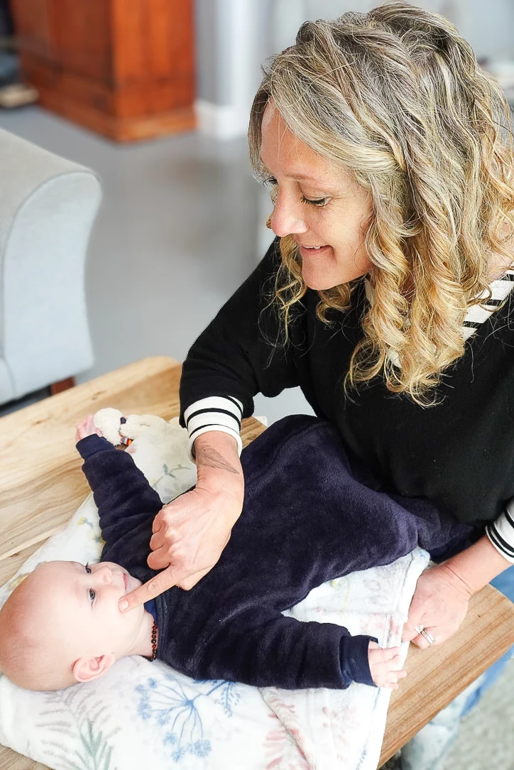 Gentle hands-on care with an infant