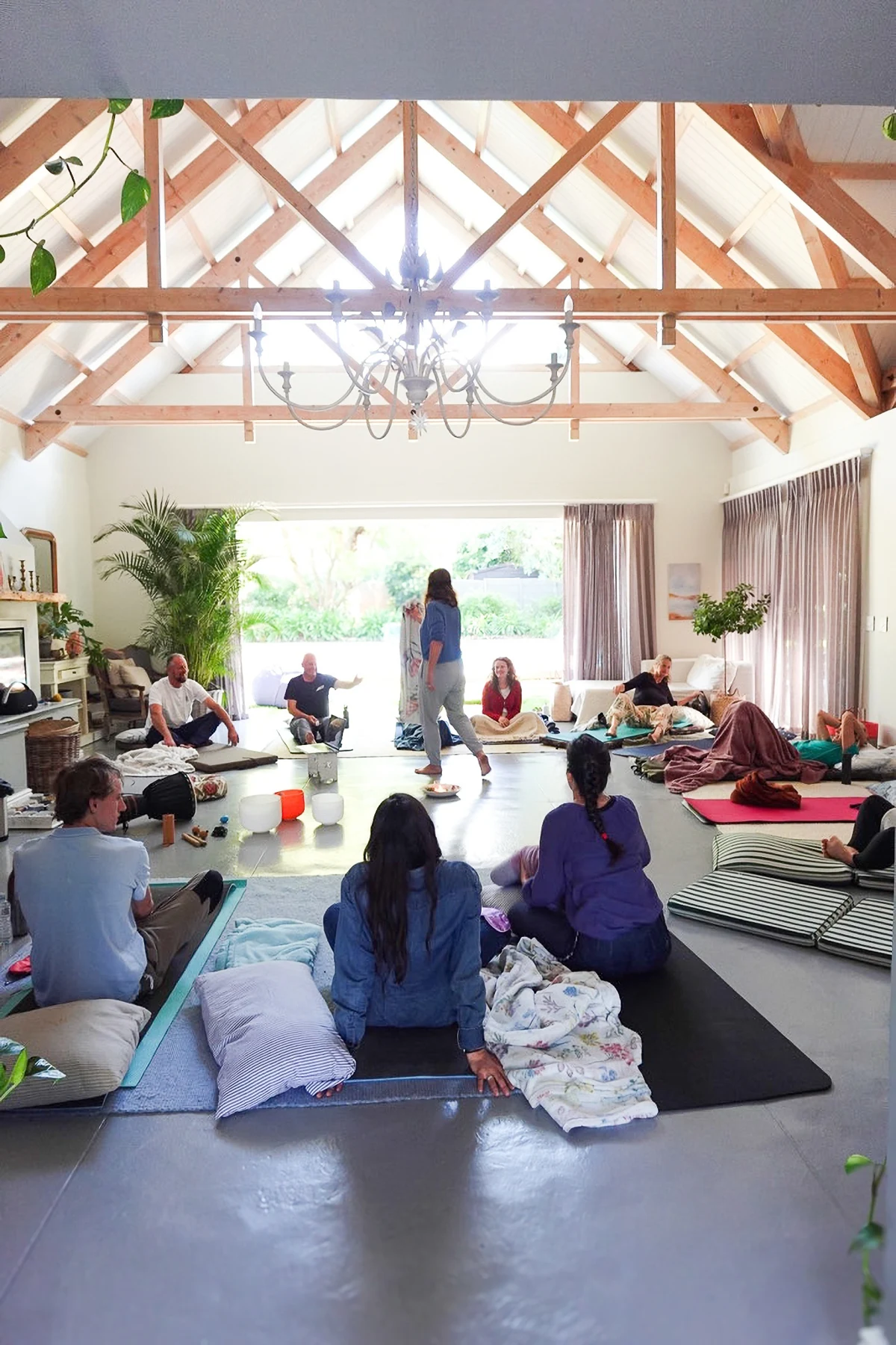 A guided breathwork group in the studio